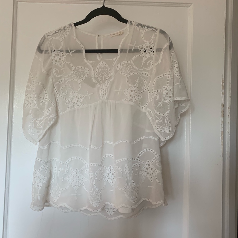 Anthro gently used silk embroidered blouse !